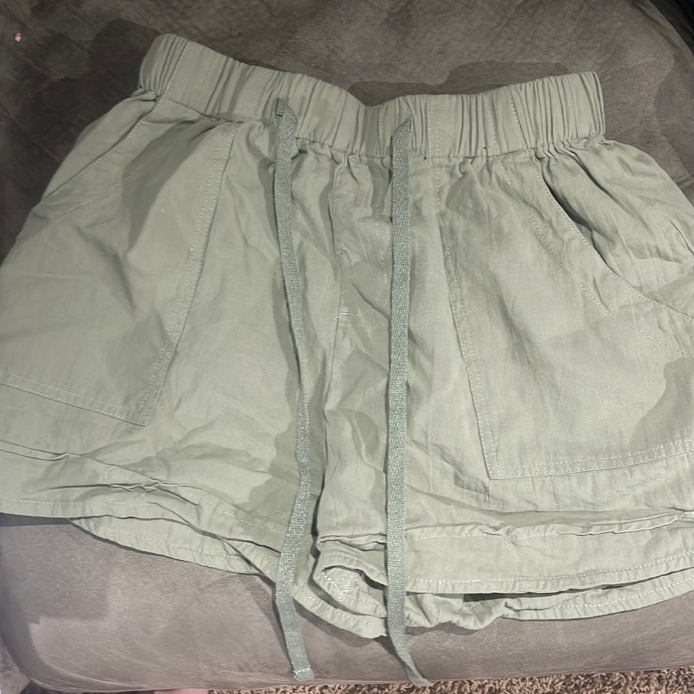 Small, green shorts, never worn